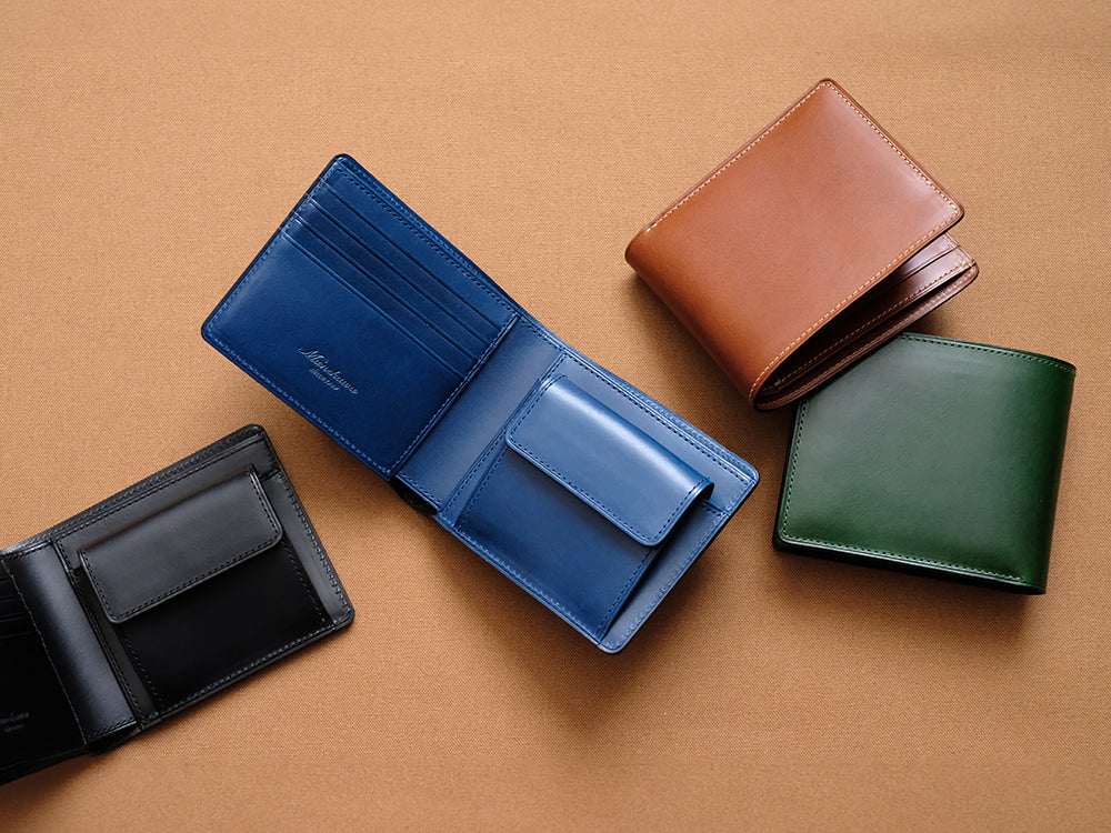 小銭入れ付き二つ折り財布“Feel Coin”