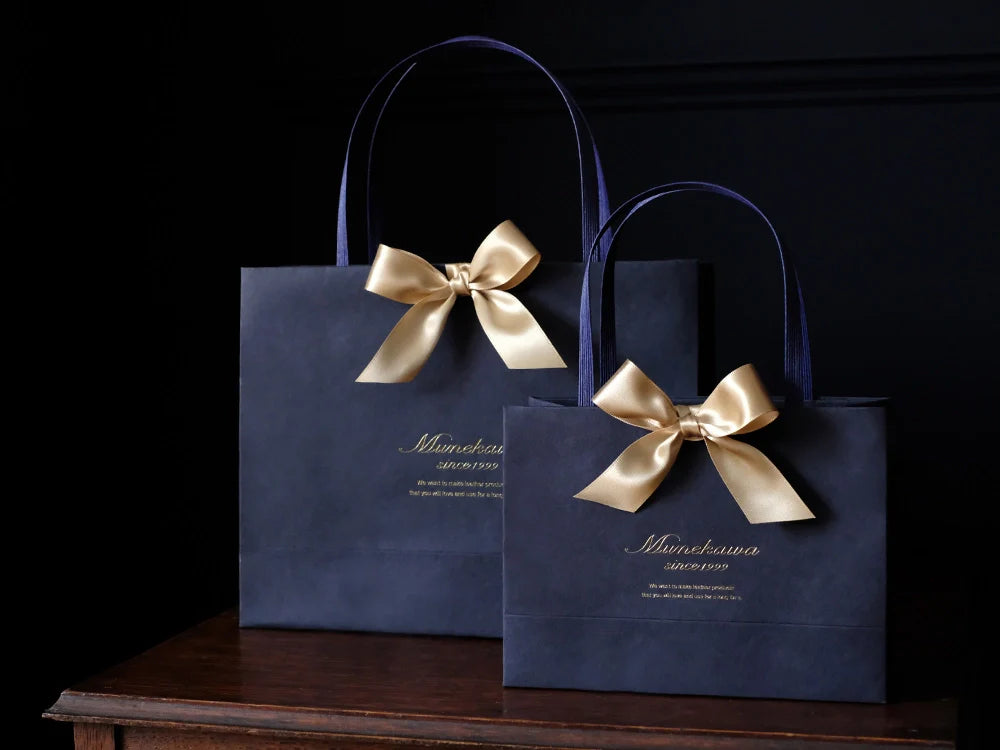 薄型二つ折り財布“Carriage”